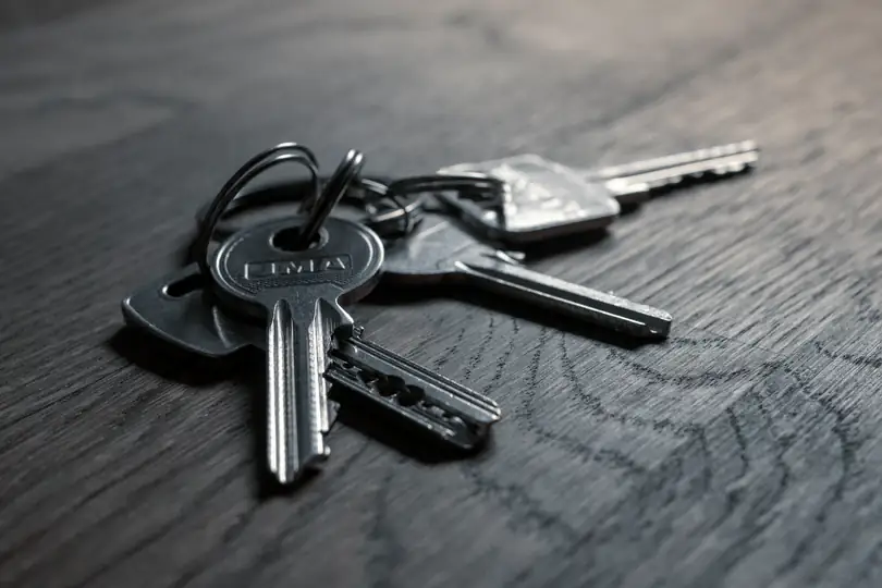 A set of keys on a timber table