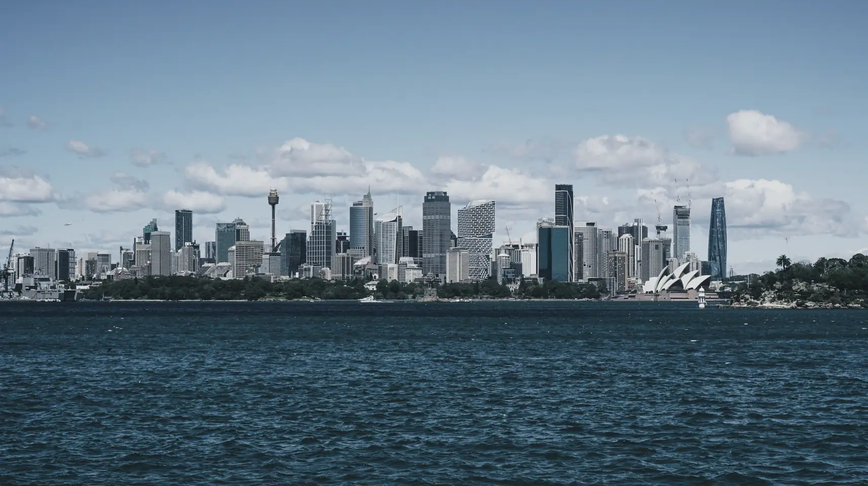City skyline seen across the harbour on a clear day